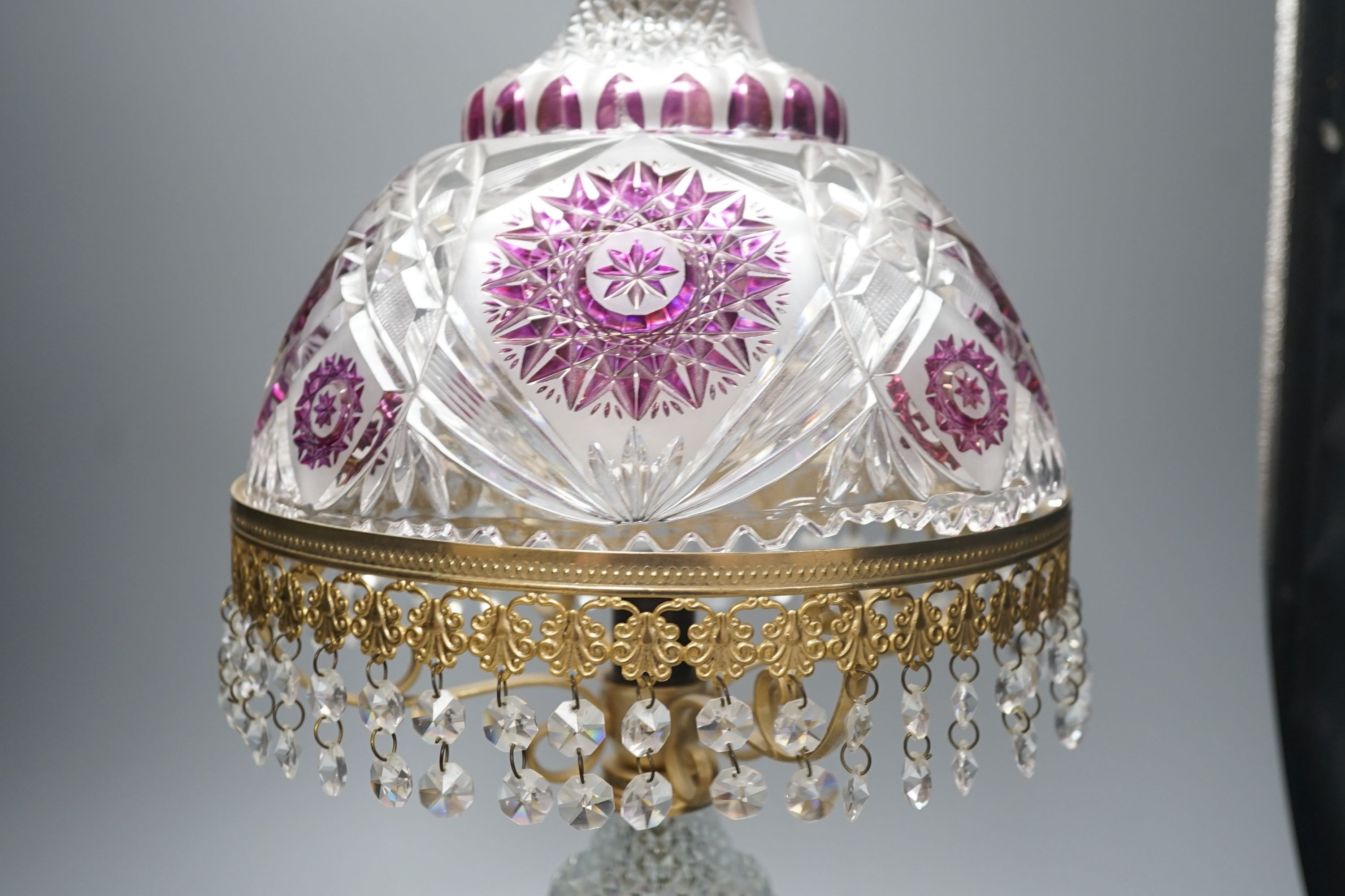 An Italian cut clear, frosted and amethyst glass table lamp with gilt metal mounts-57 cms high.